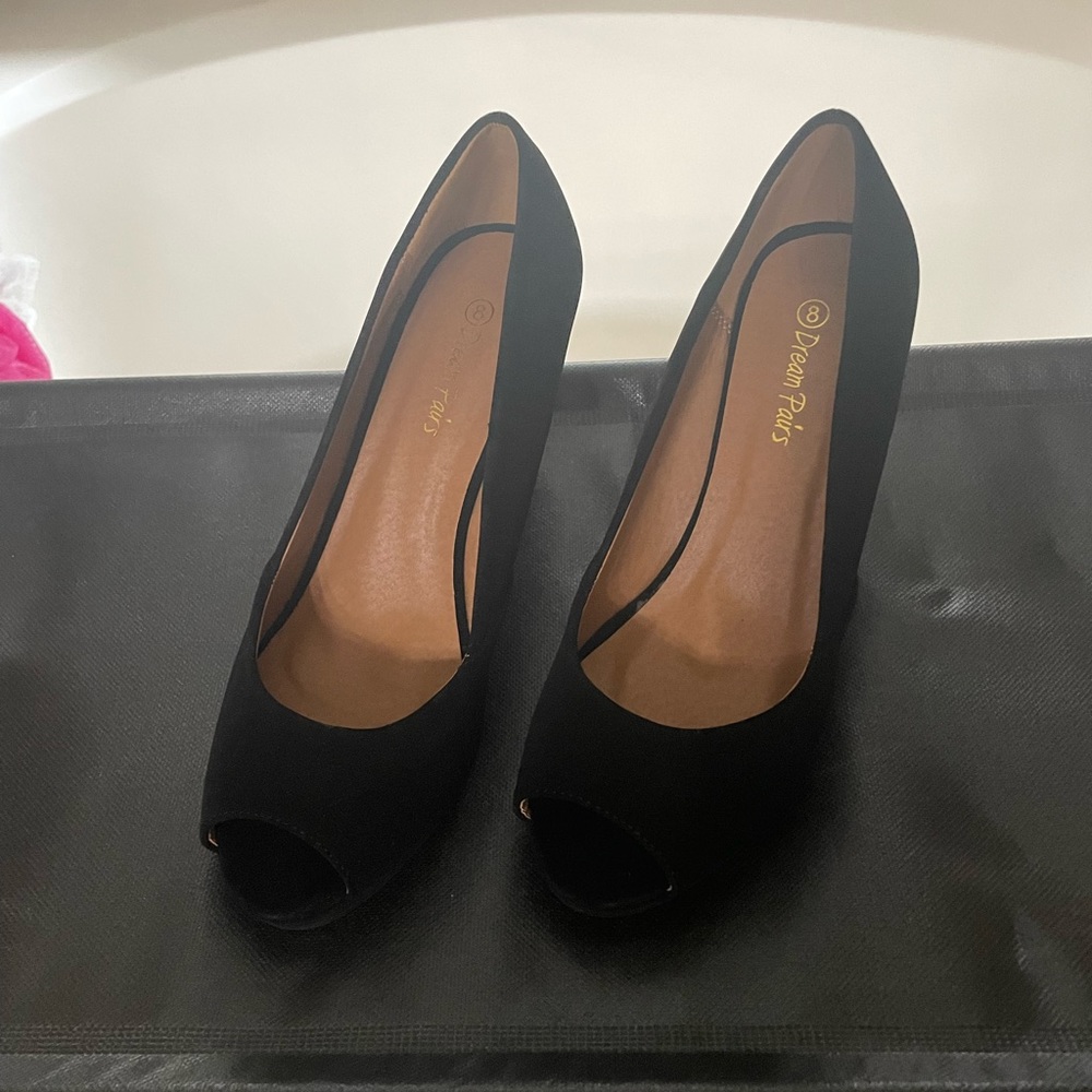 NWOT Black wedges, size 8. Never worn.